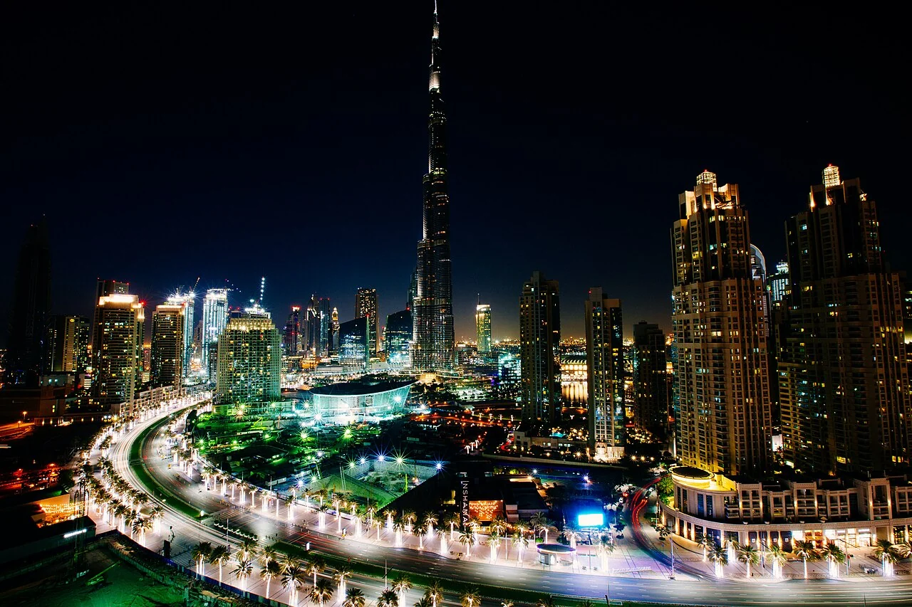 Dubai skyline and illuminated highways at night